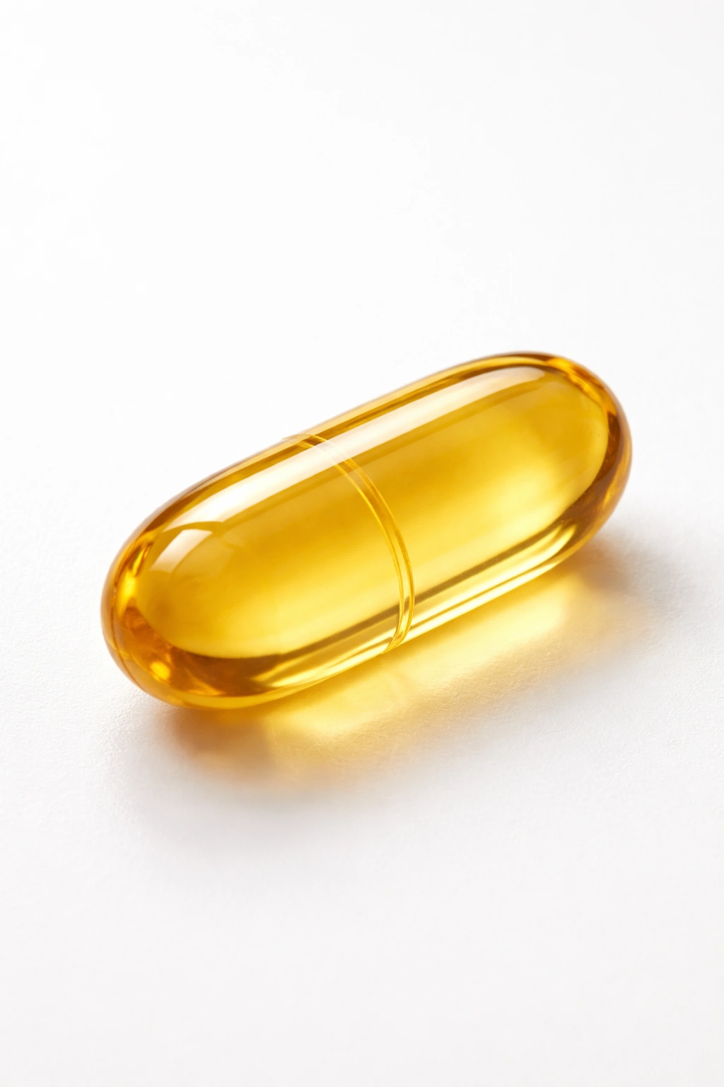 Biotin supplement capsule on white background