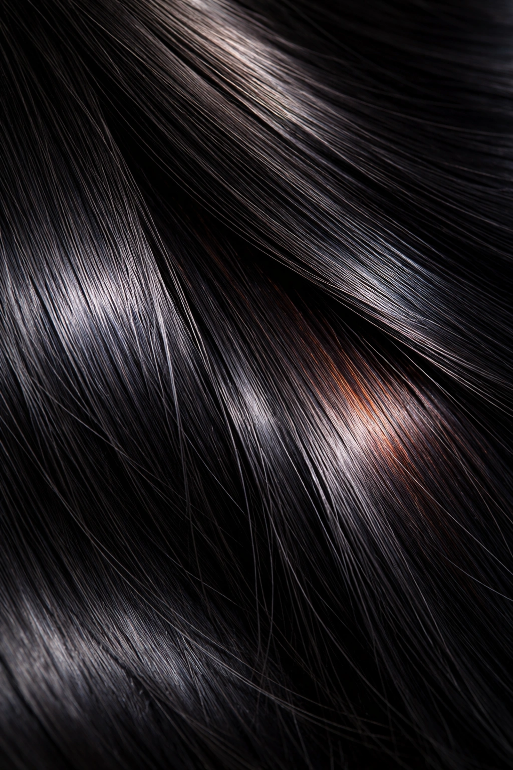 Close-up of deep brown-black hair showing subtle undertones