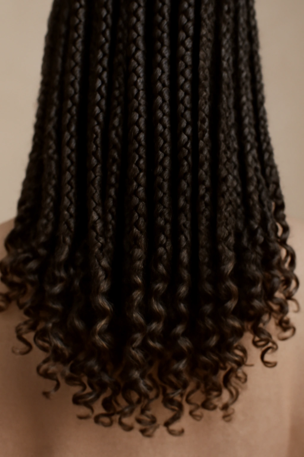 20 Box Braid Styles From Short Bobs to Waist Length 7 Close-up of box braids with curly ends, showing curled tips and texture