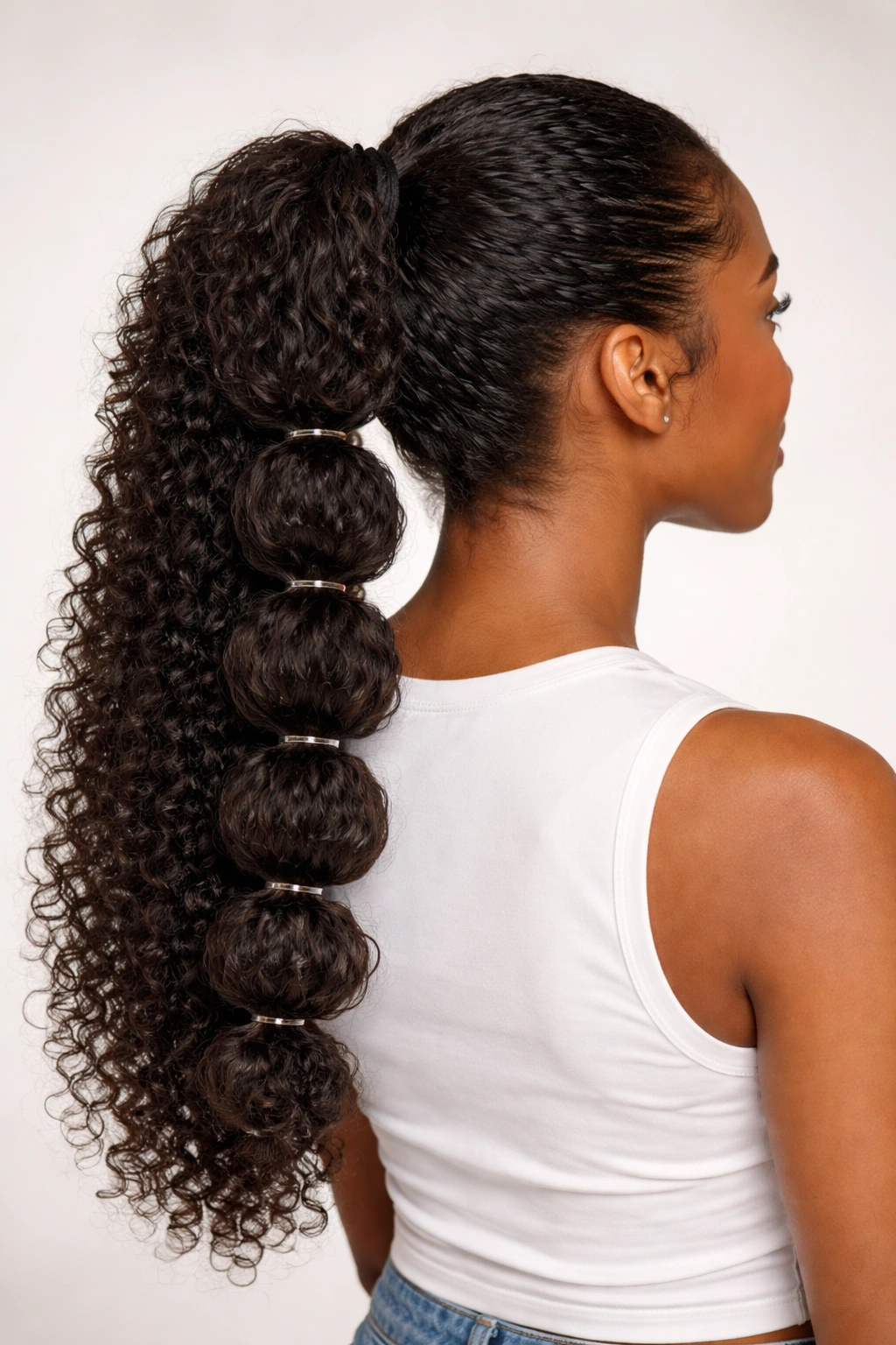 Bubble braids with elastic bubble segments along a ponytail