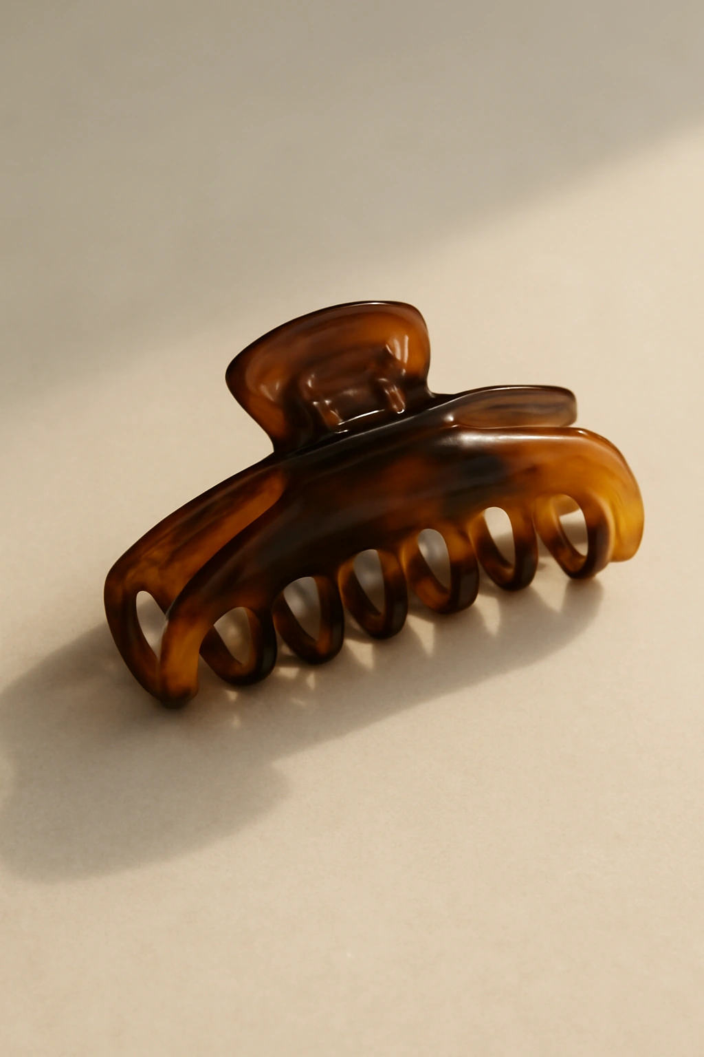 10 Claw Clip Hairstyles That Work for Black Hair 11 Minimalist still life with a single claw clip on a clean surface