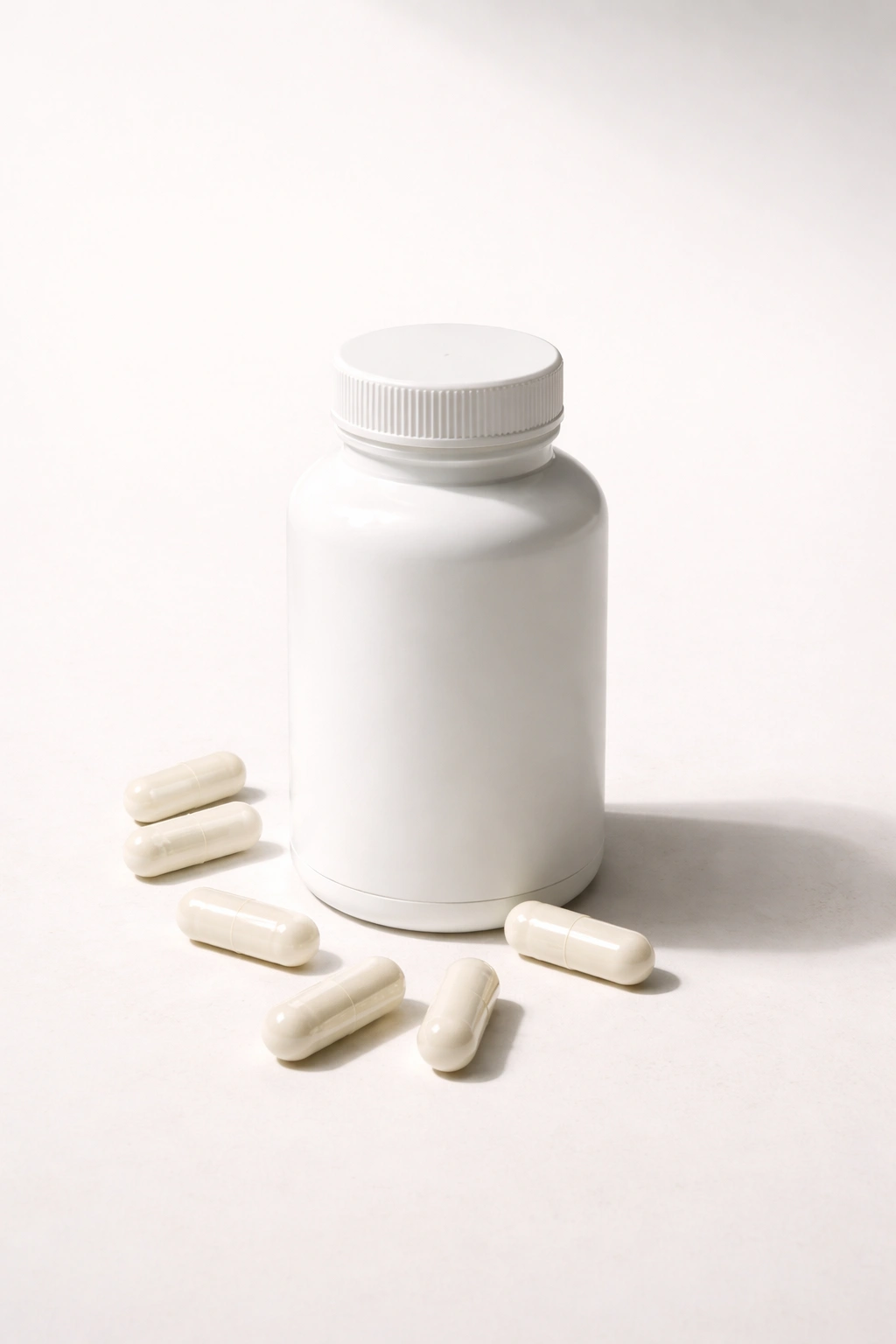 Unlabeled collagen supplement bottle on a plain surface