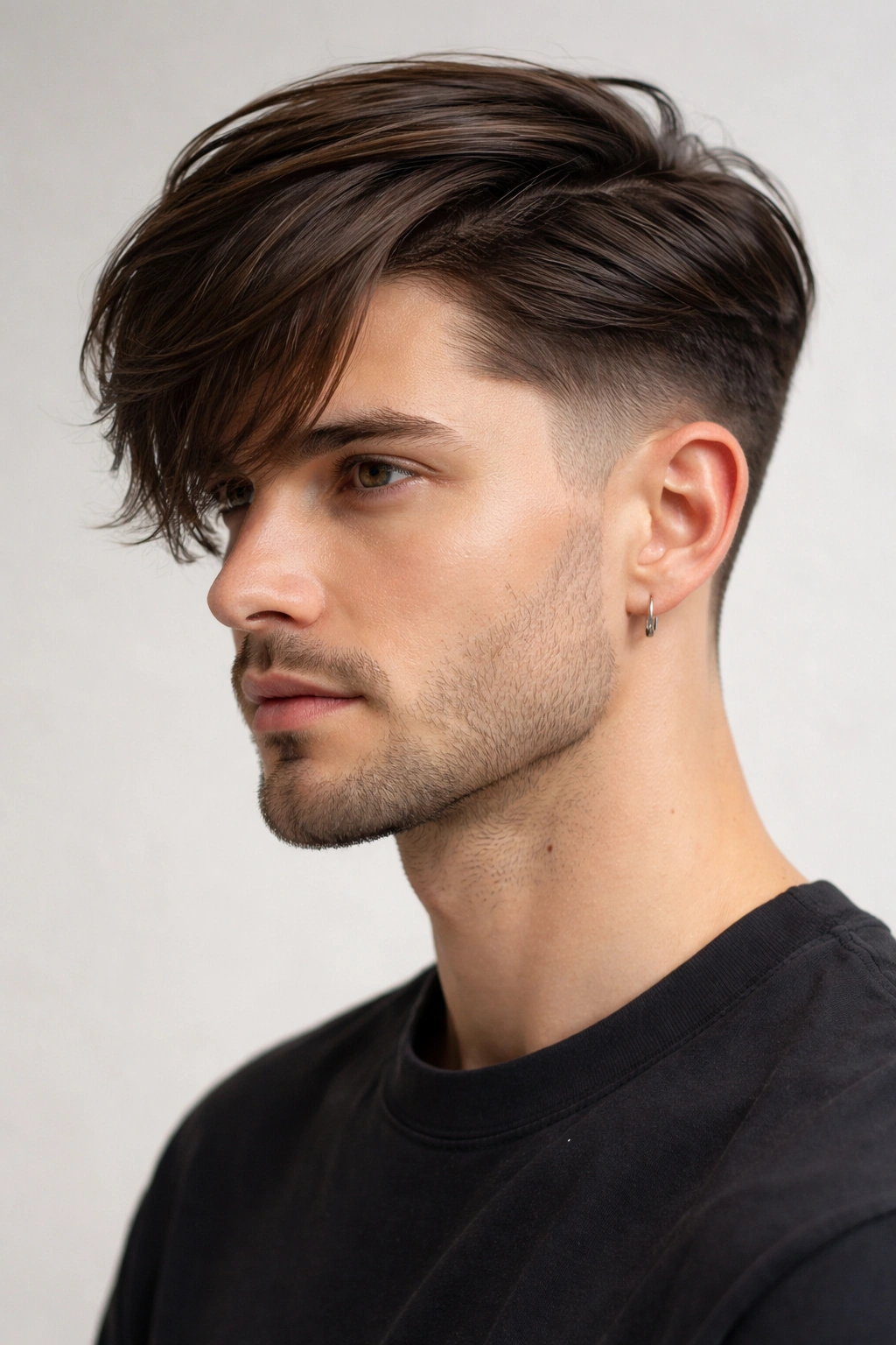 Side-parted hair with curtain-cut over an undercut, viewed in profile.