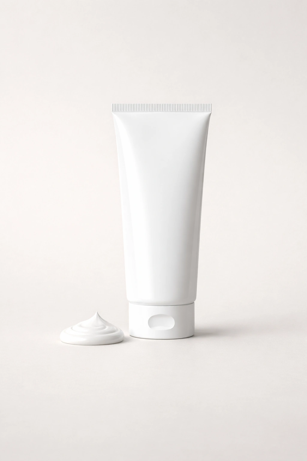 Plain depilatory cream tube on neutral background