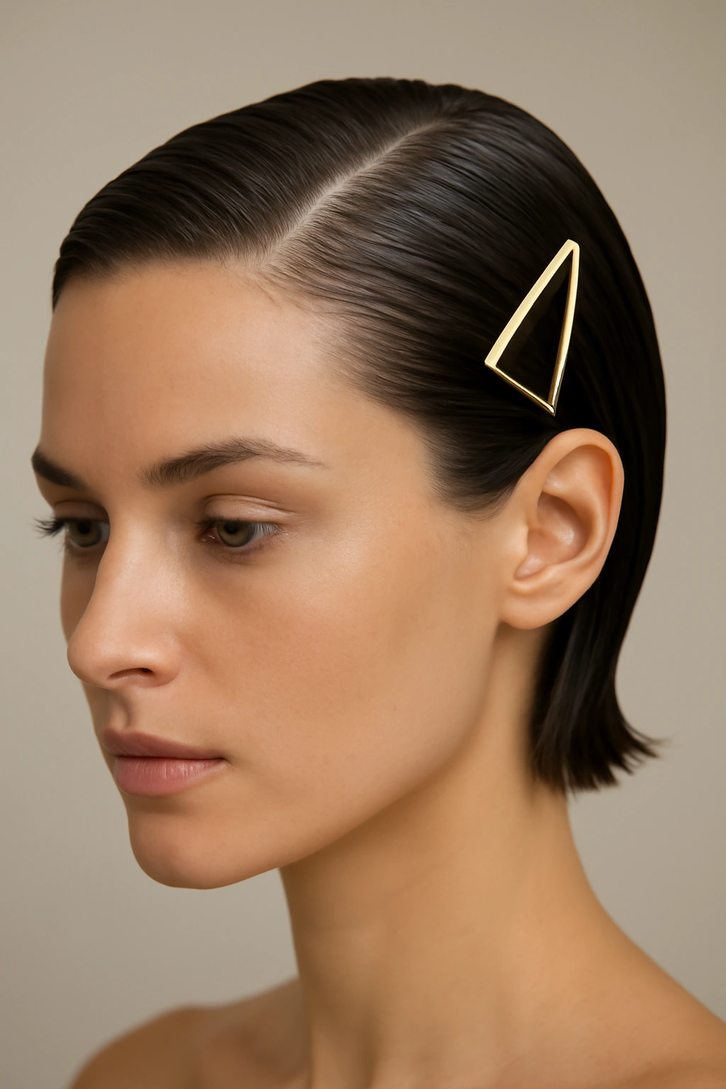 15 Wedding Hairstyles That Look Great on Short Hair 12 Sleek gel-slicked hairstyle with geometric clip.