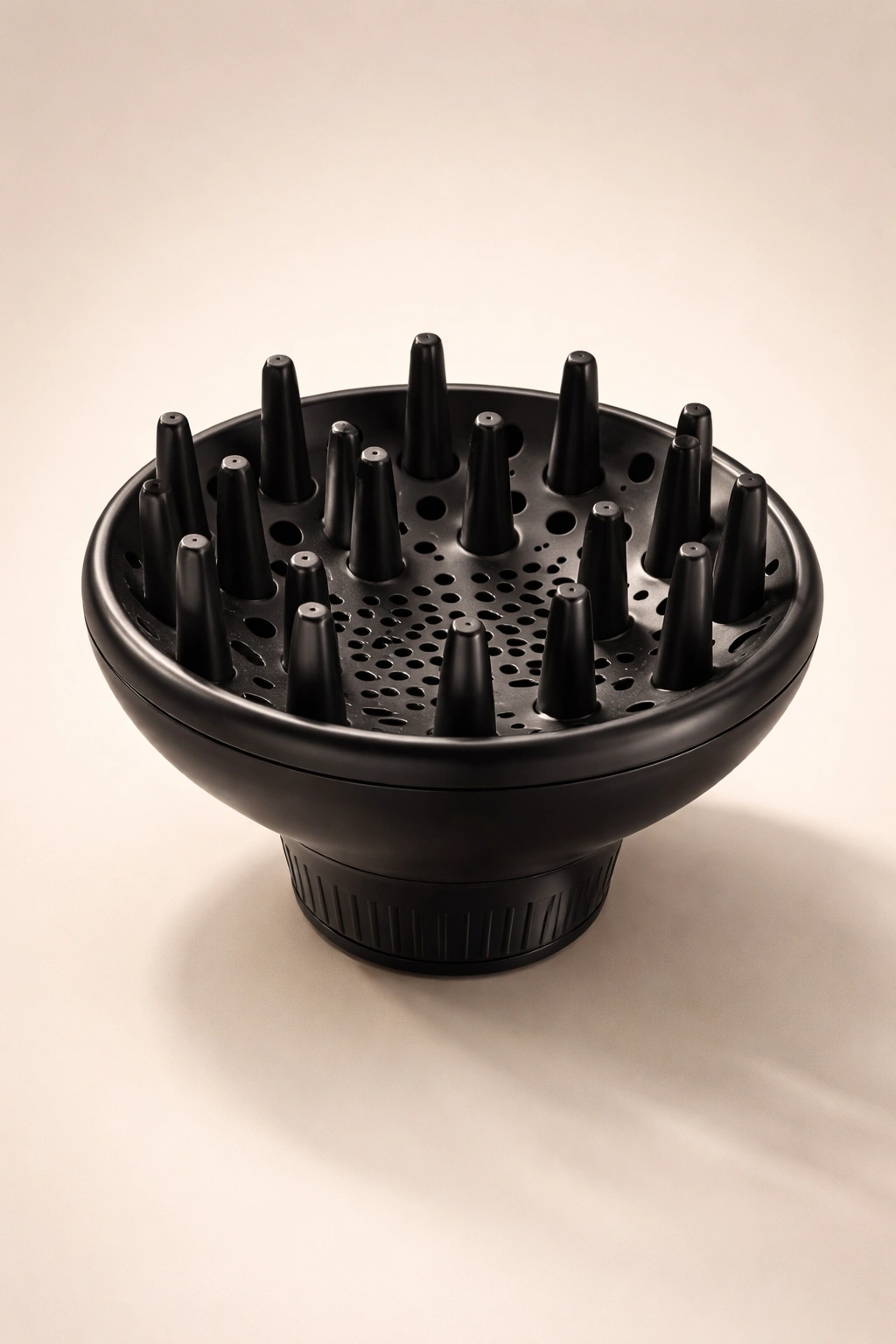 Isolated diffuser with soft lighting implying curly/wavy hair suitability