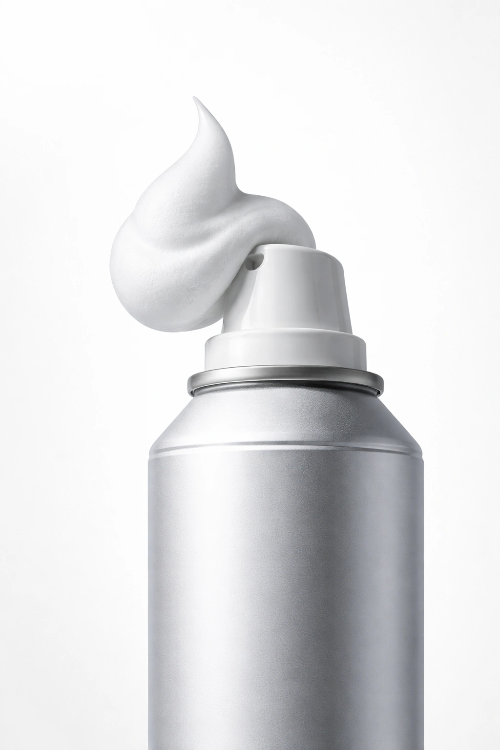 Mousse bottle with a precise foam plume on a clean studio backdrop for optimized application.