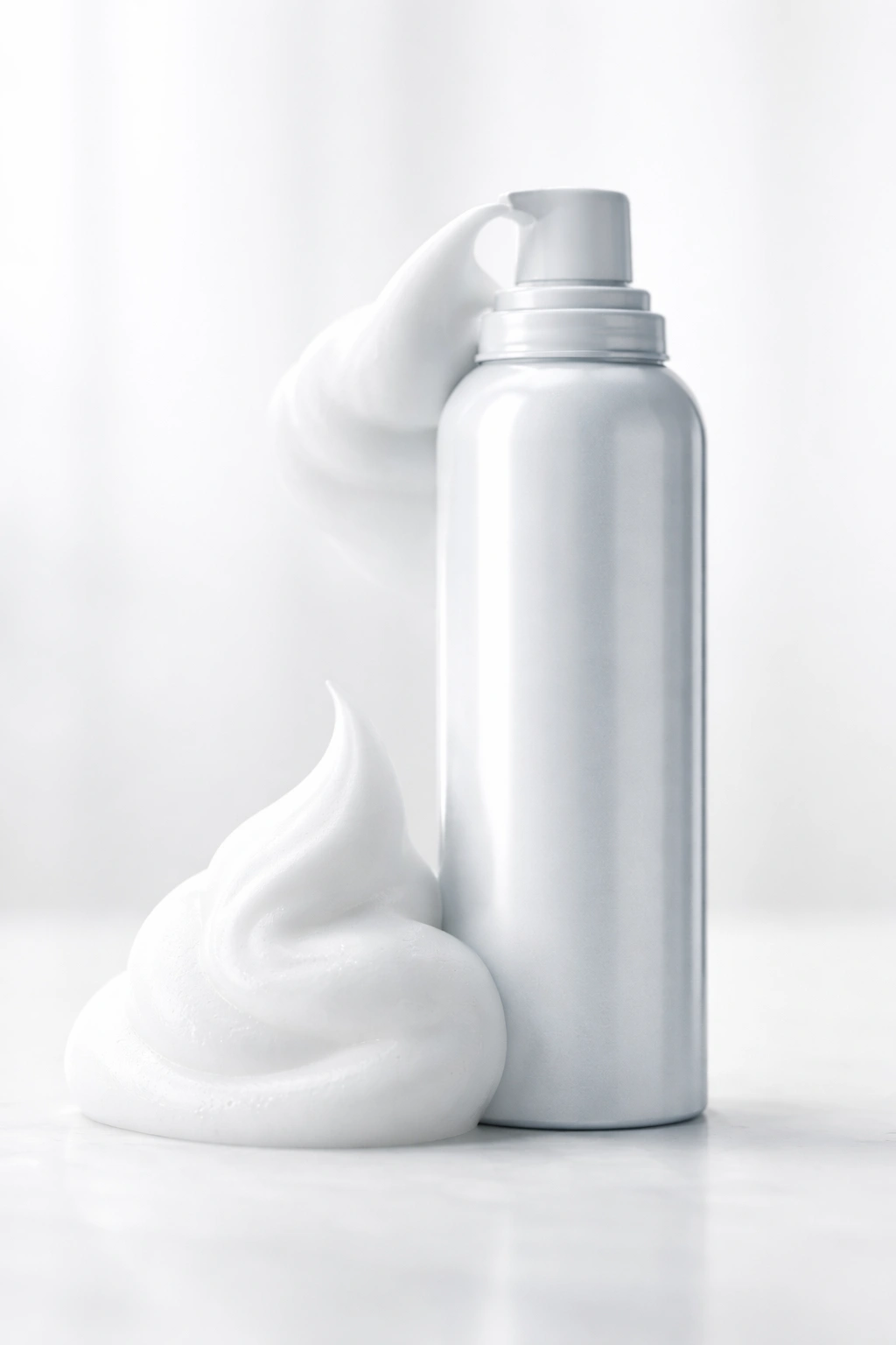 Mousse can with misty foam isolated on white background