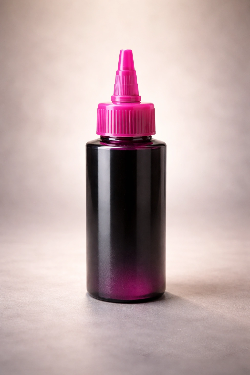 Close-up of a blank semi-permanent dye bottle with vibrant color in a studio setting