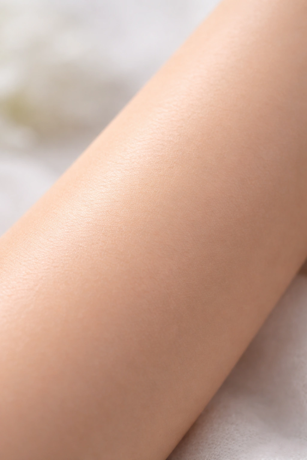 Close-up of sensitive forearm skin with calm texture and minimal irritation