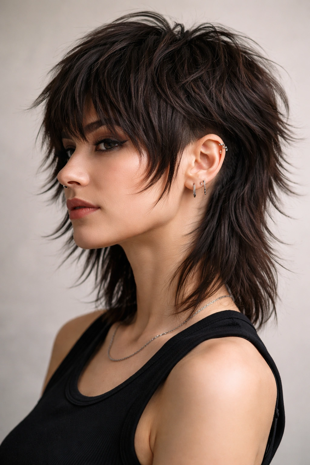 Choppy shag haircut with undercut and layered crown