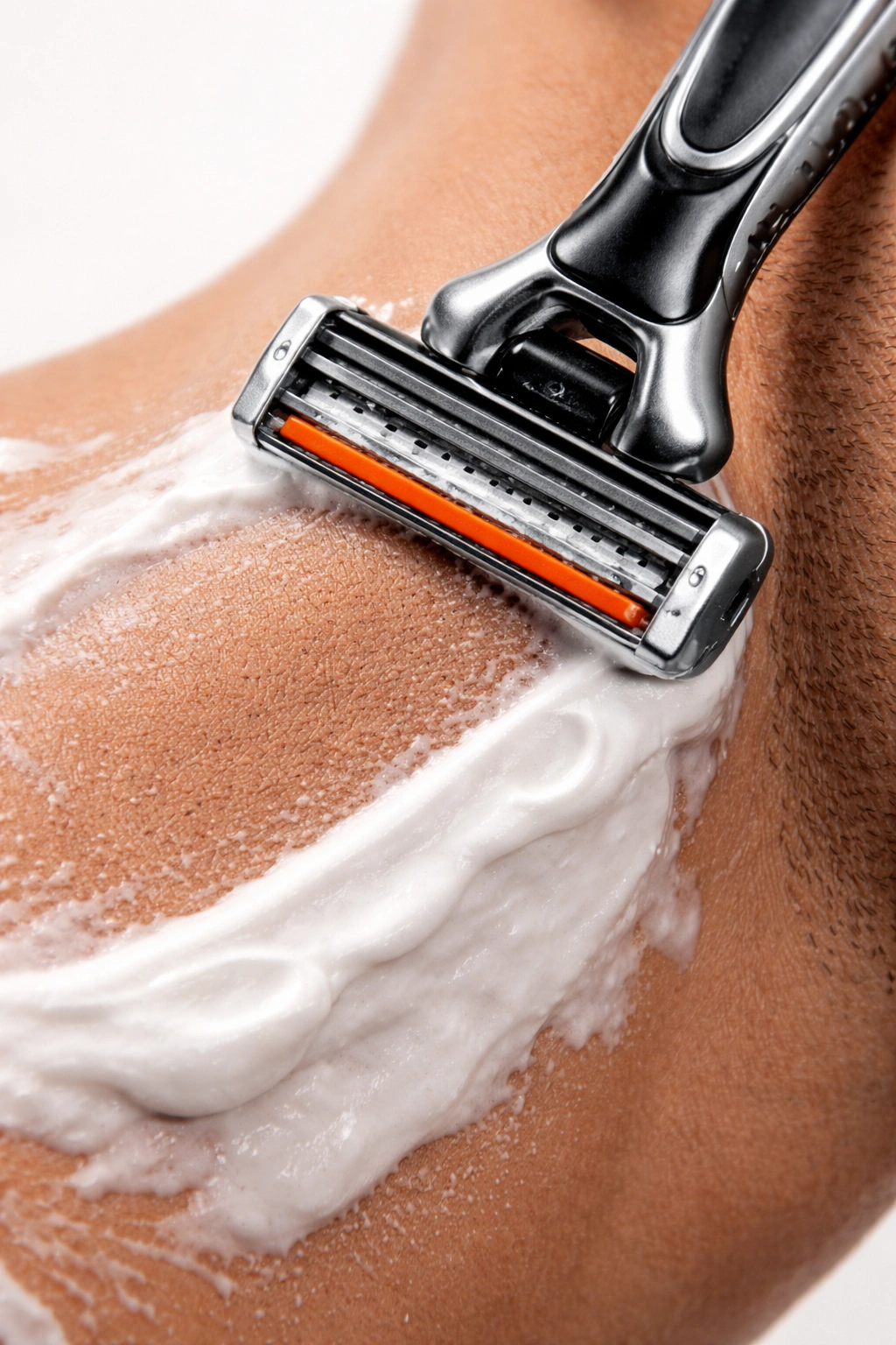 Razor gliding over skin demonstrating proper shaving technique