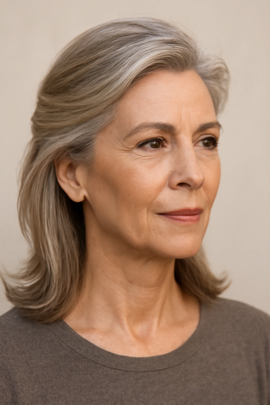 15 Modern Hairstyles for Older Women With Great Style 8 Mature woman with swept-back layers exposing an open face frame