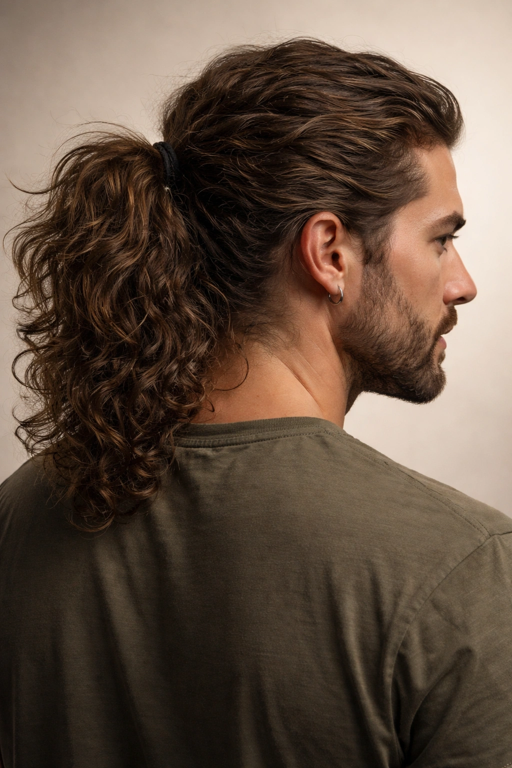 Close-up of a textured ponytail with natural waves and curls