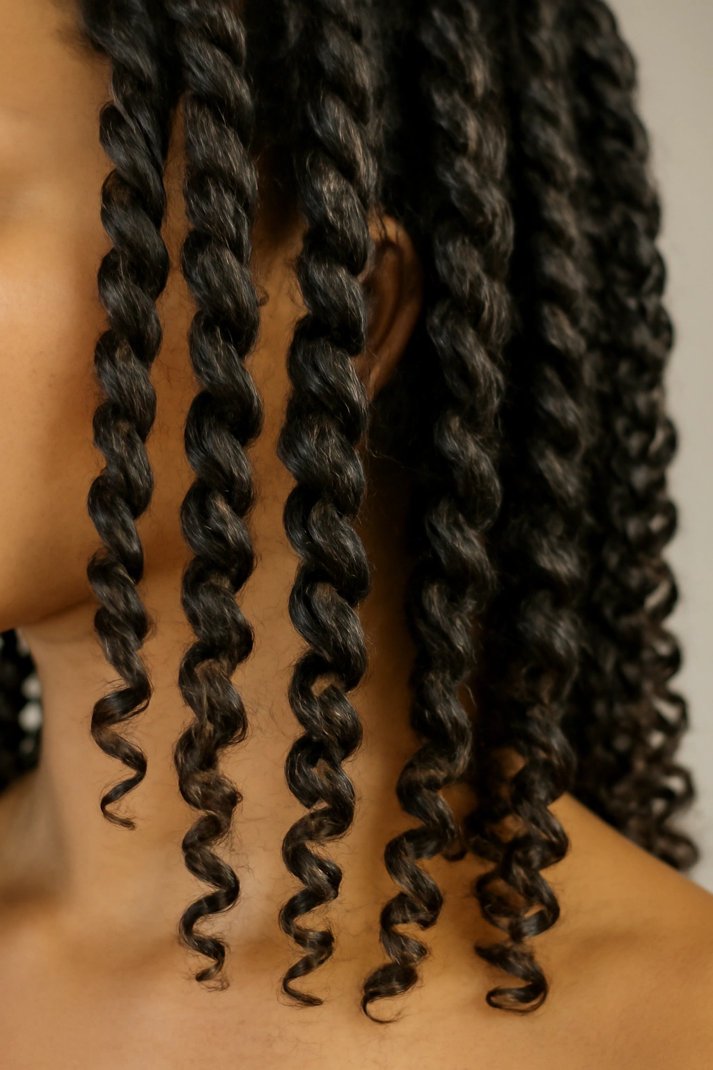 15 Heatless Wavy Hairstyles Anyone Can Pull Off 4 Close-up of hair in even two-strand twists forming defined curls