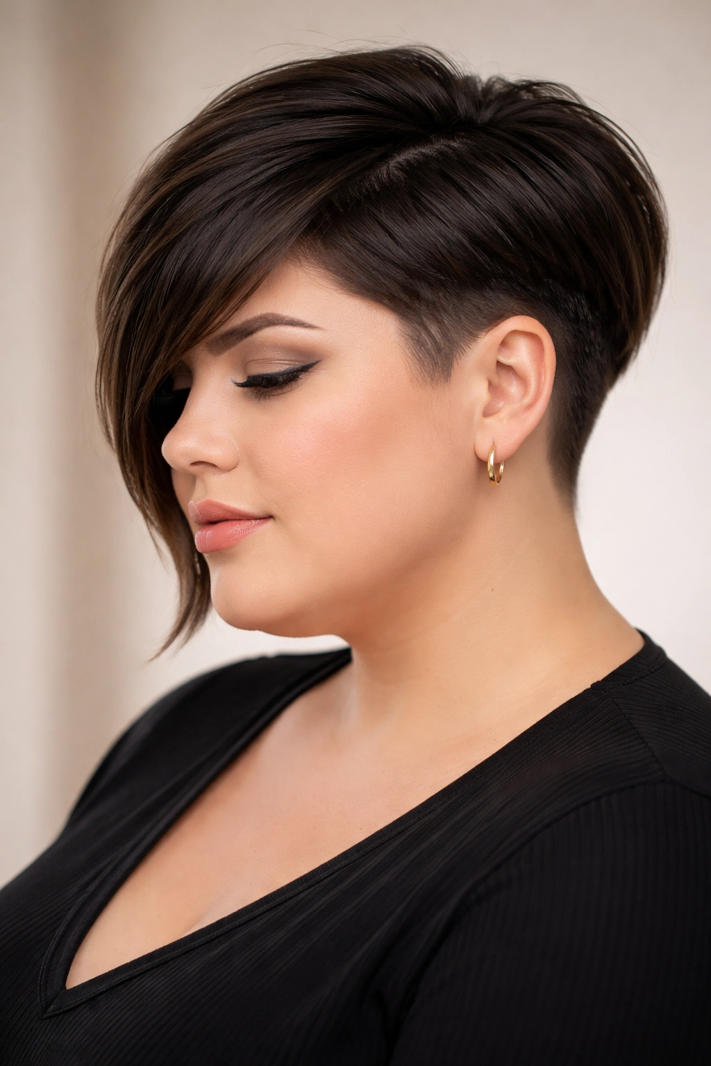 Undercut bob hairstyle with angled bangs and longer top
