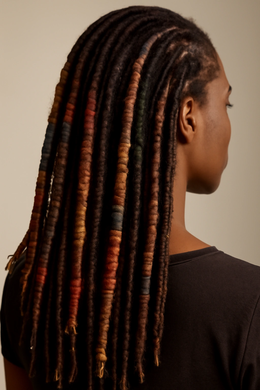 18 Dreadlock Styles Sorted From Short to Long 12 Wrapped locs with visible fiber wraps along their length