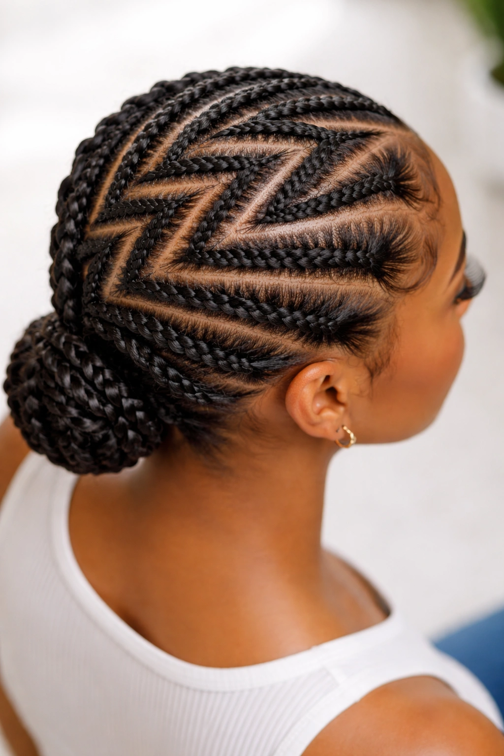 Zig-zag pattern created by flat twists across the scalp